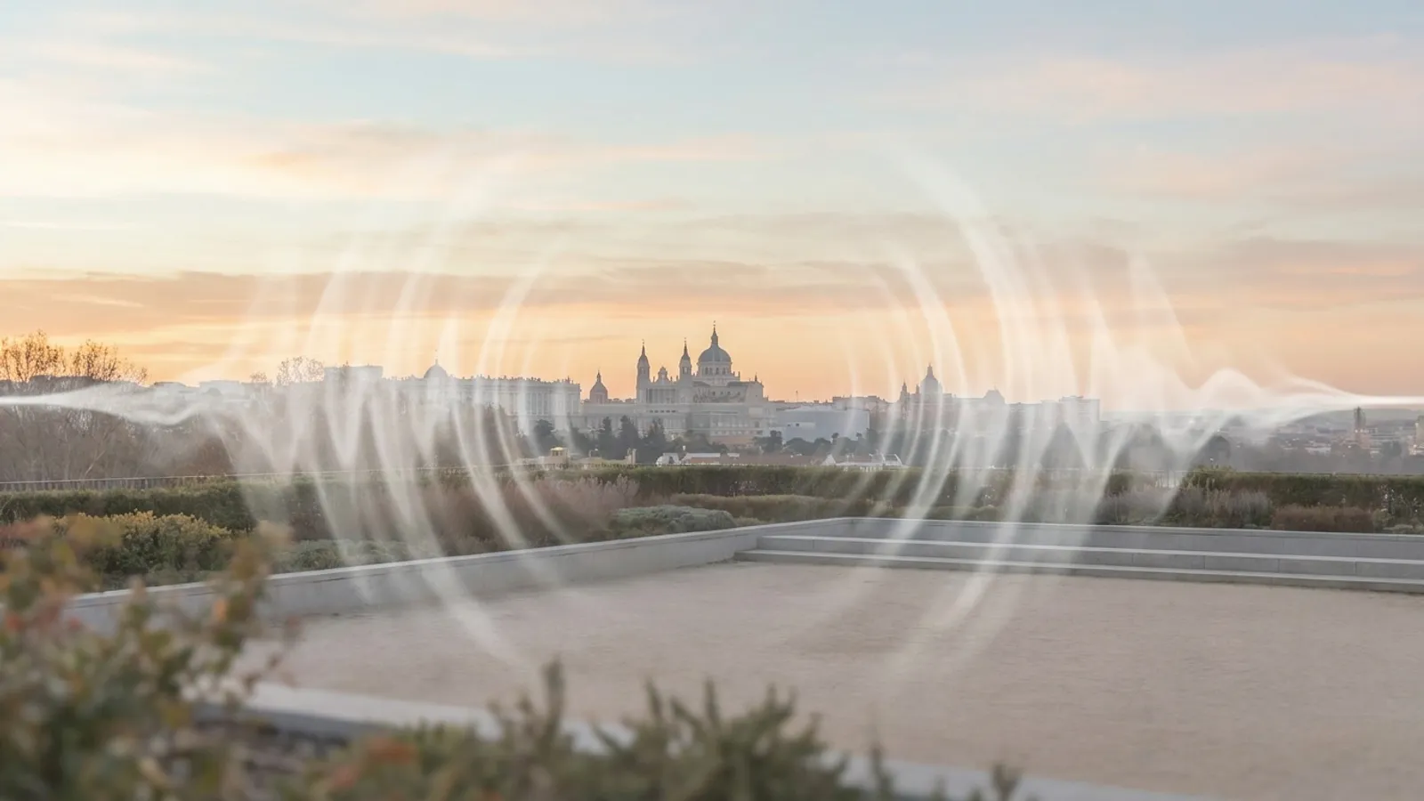 Abstract sound waves creating calming patterns over a serene Madrid skyline at dawn